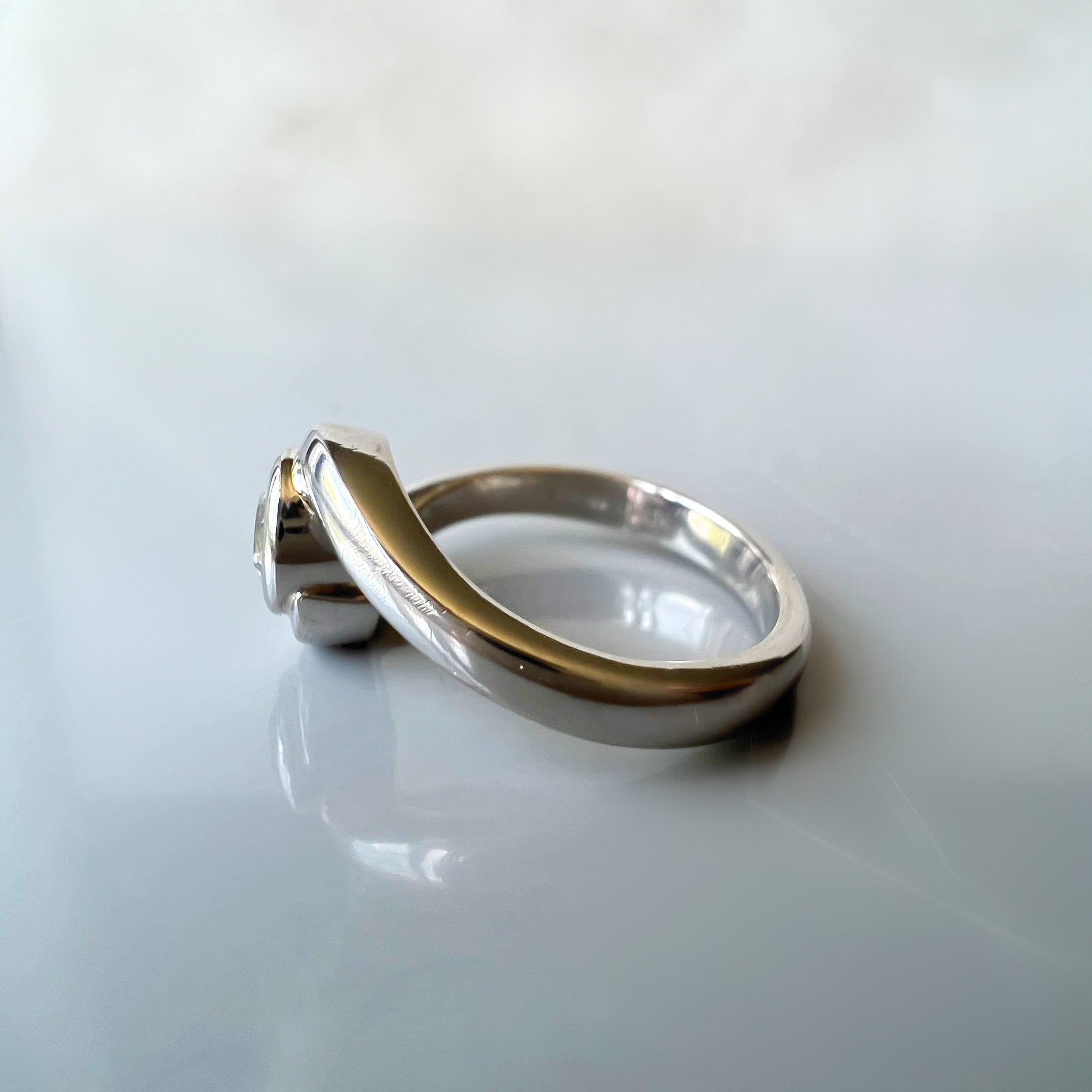 Platinum and Diamond Swirl Ring