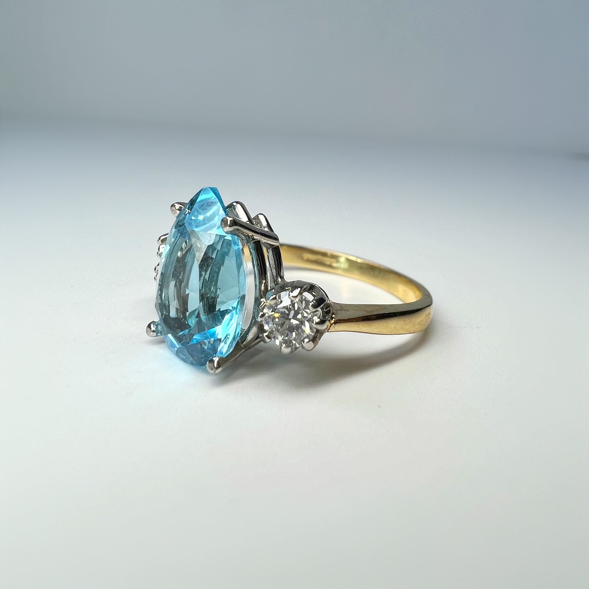 Pear Shaped Blue Topaz and Diamond Ring