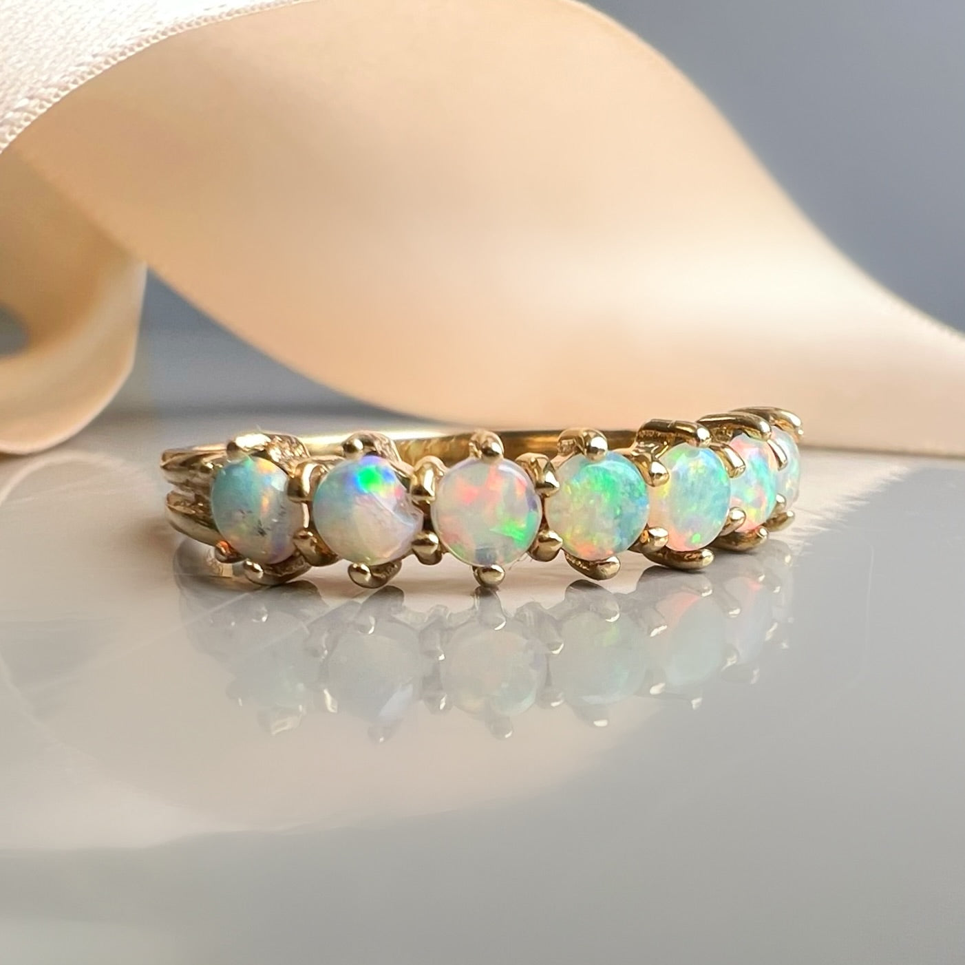 Opal 9ct Gold 7 Stone Ring
