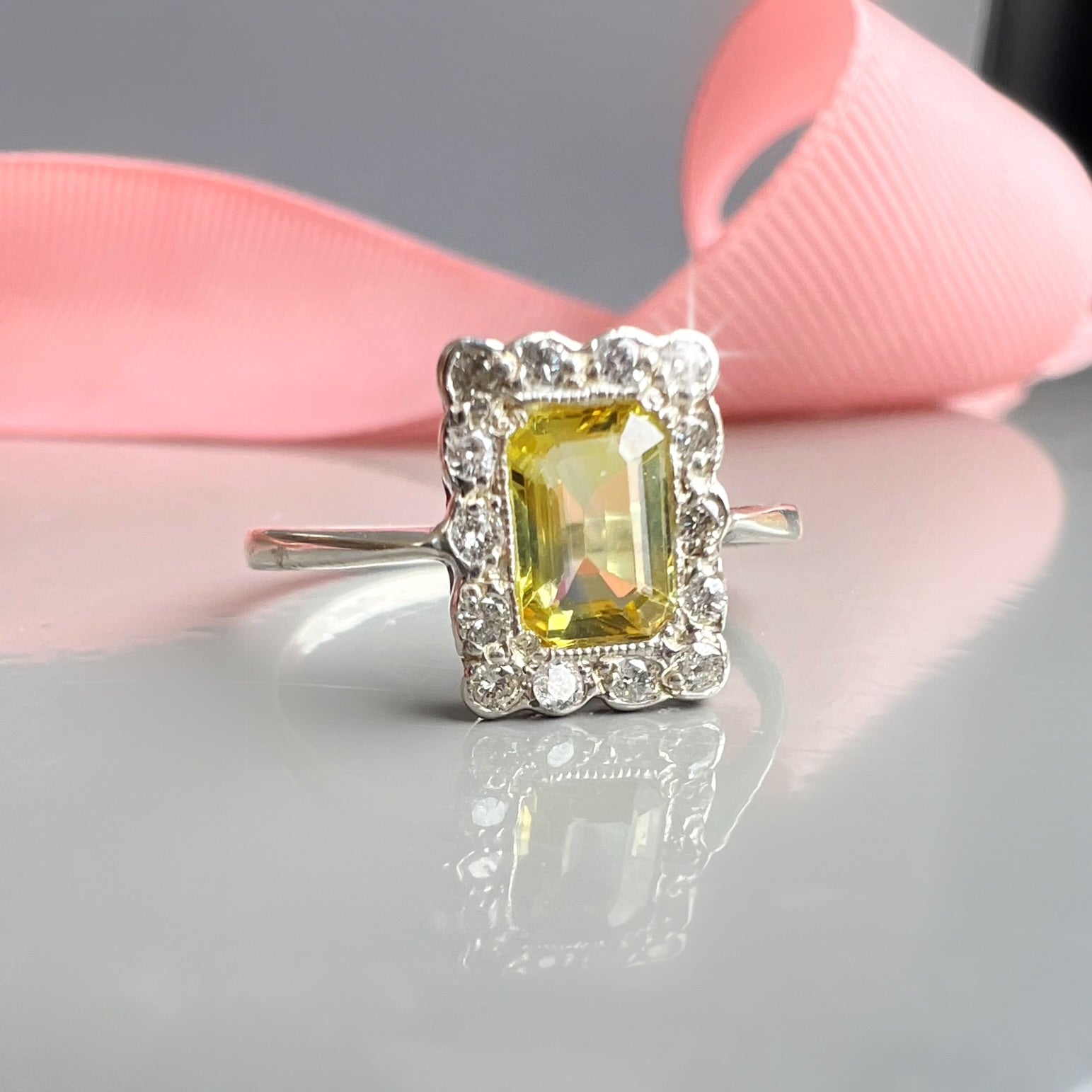 Yellow Sapphire and Diamond Halo Ring
