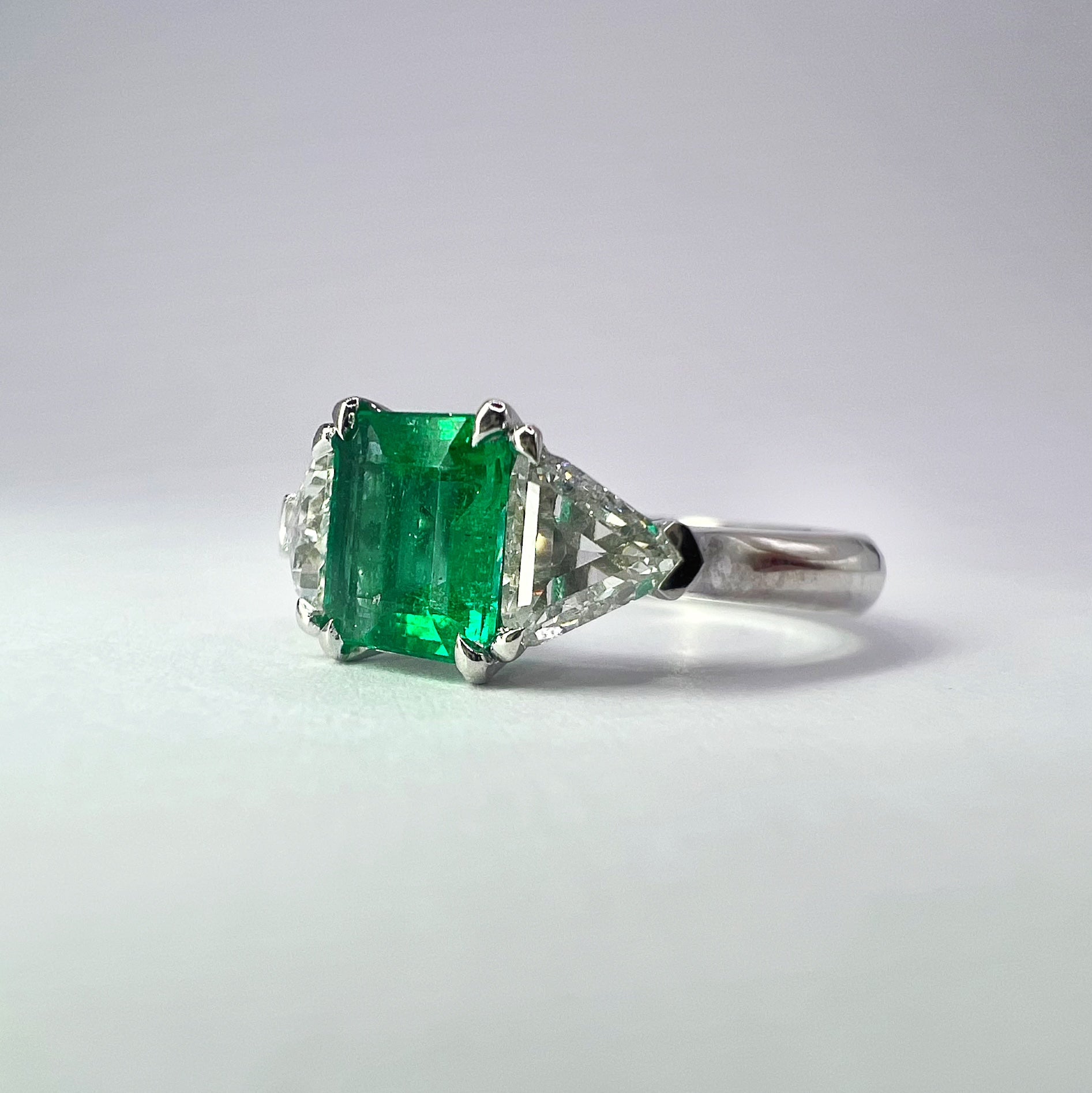 Emerald and Diamond Trillion Cut Three Stone Ring