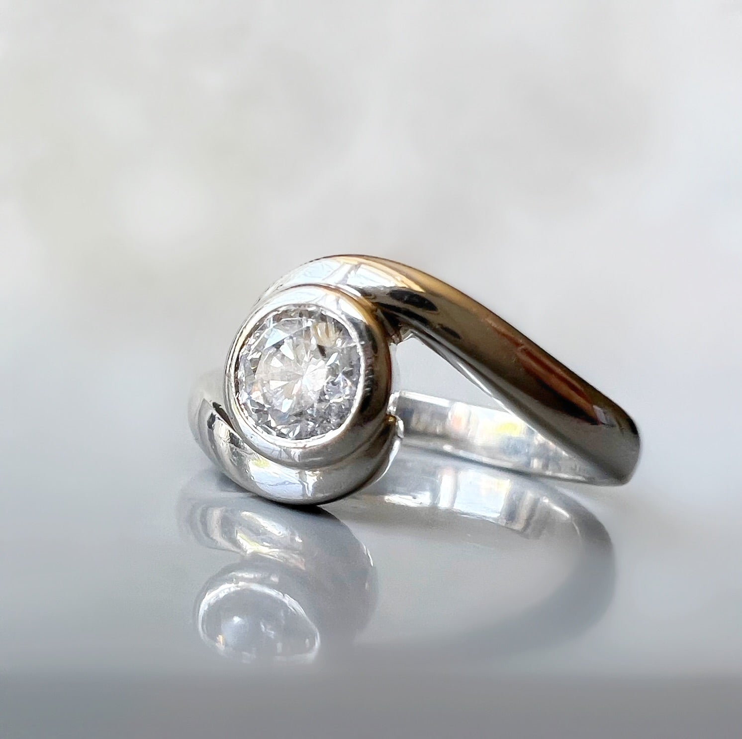 Platinum and Diamond Swirl Ring