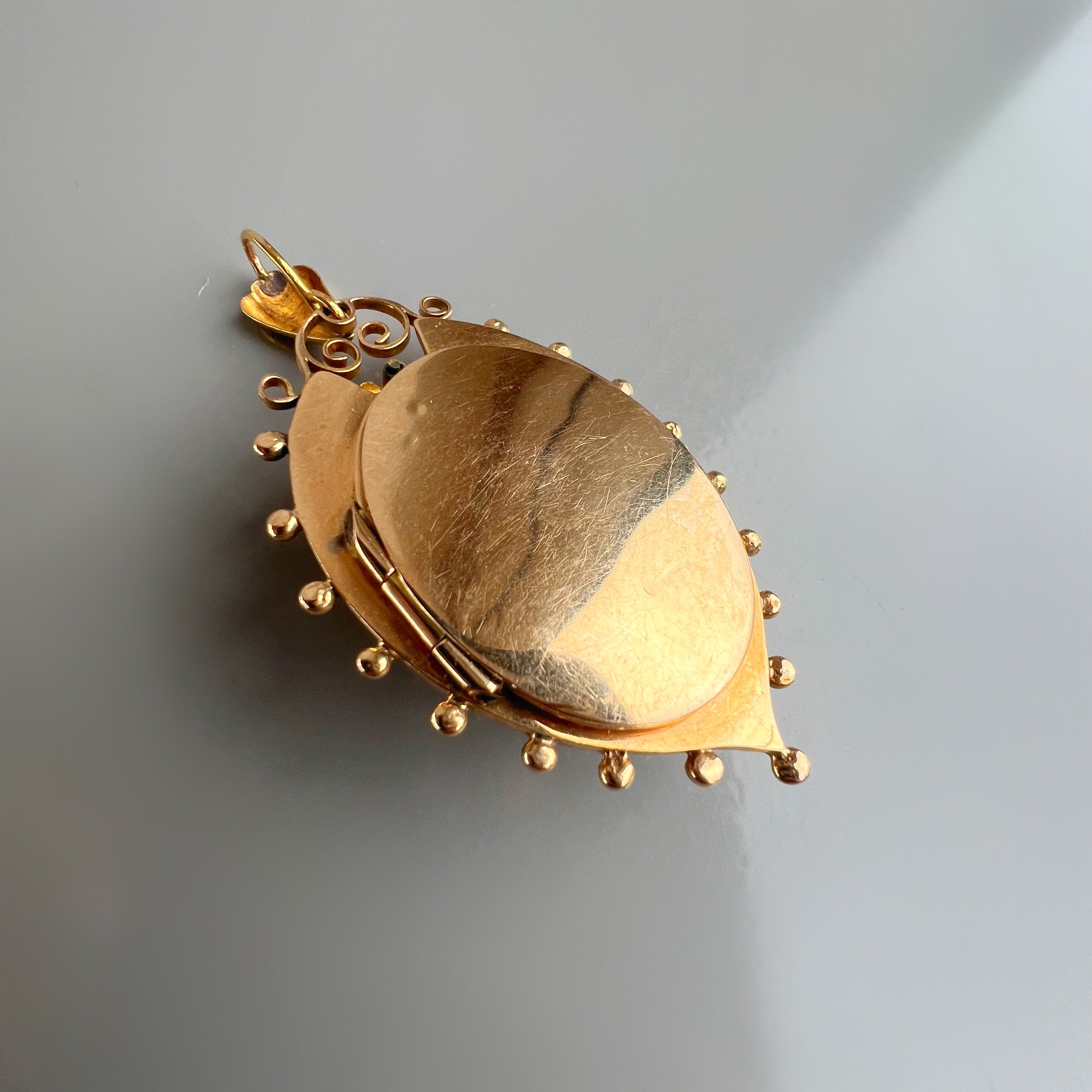 Antique Gold Locket with Ruby and Pearl Details