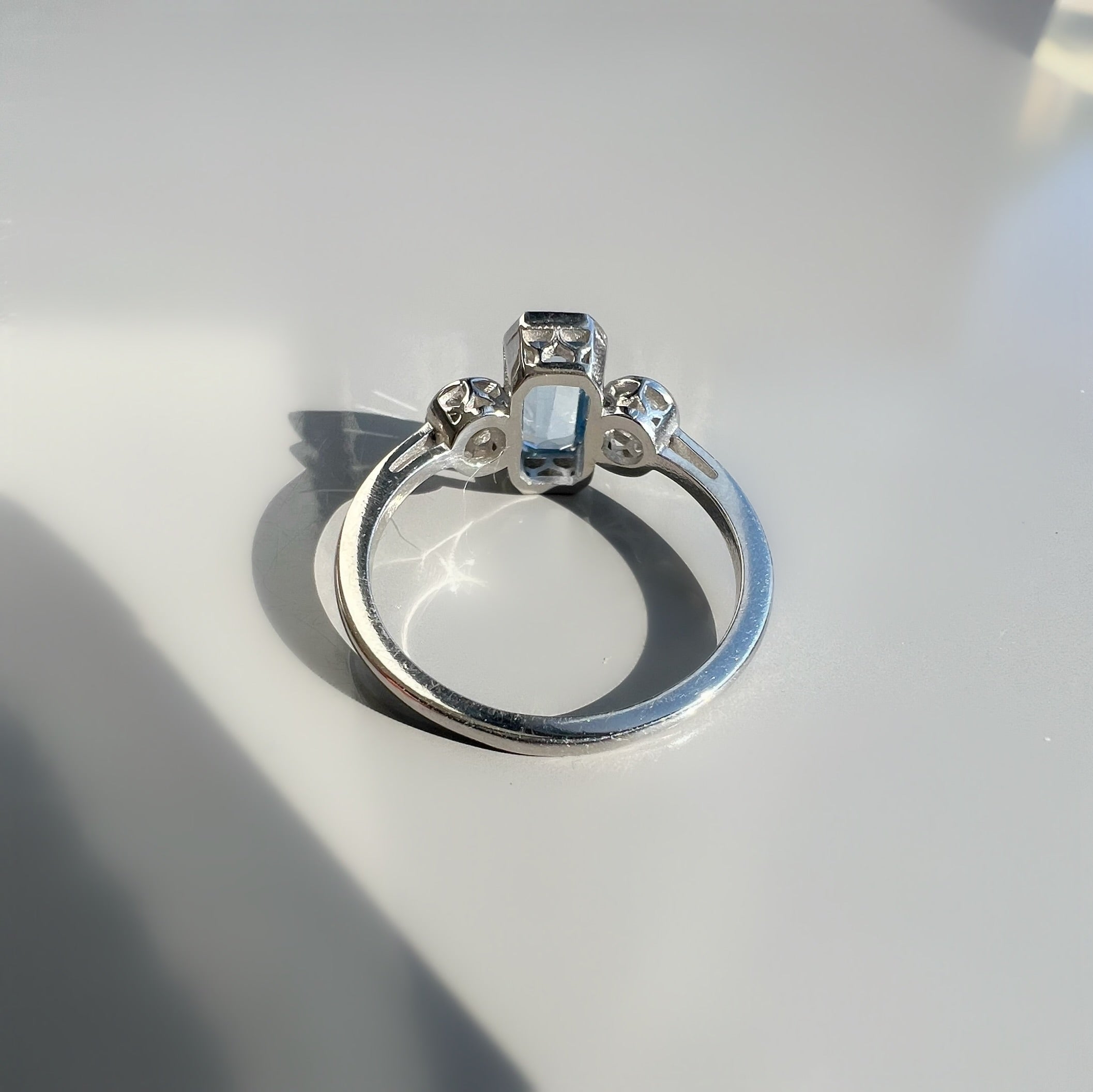 Bezel Set 0.80ct Aquamarine and 0.40ct Diamond 3 Stone ring in Platinum