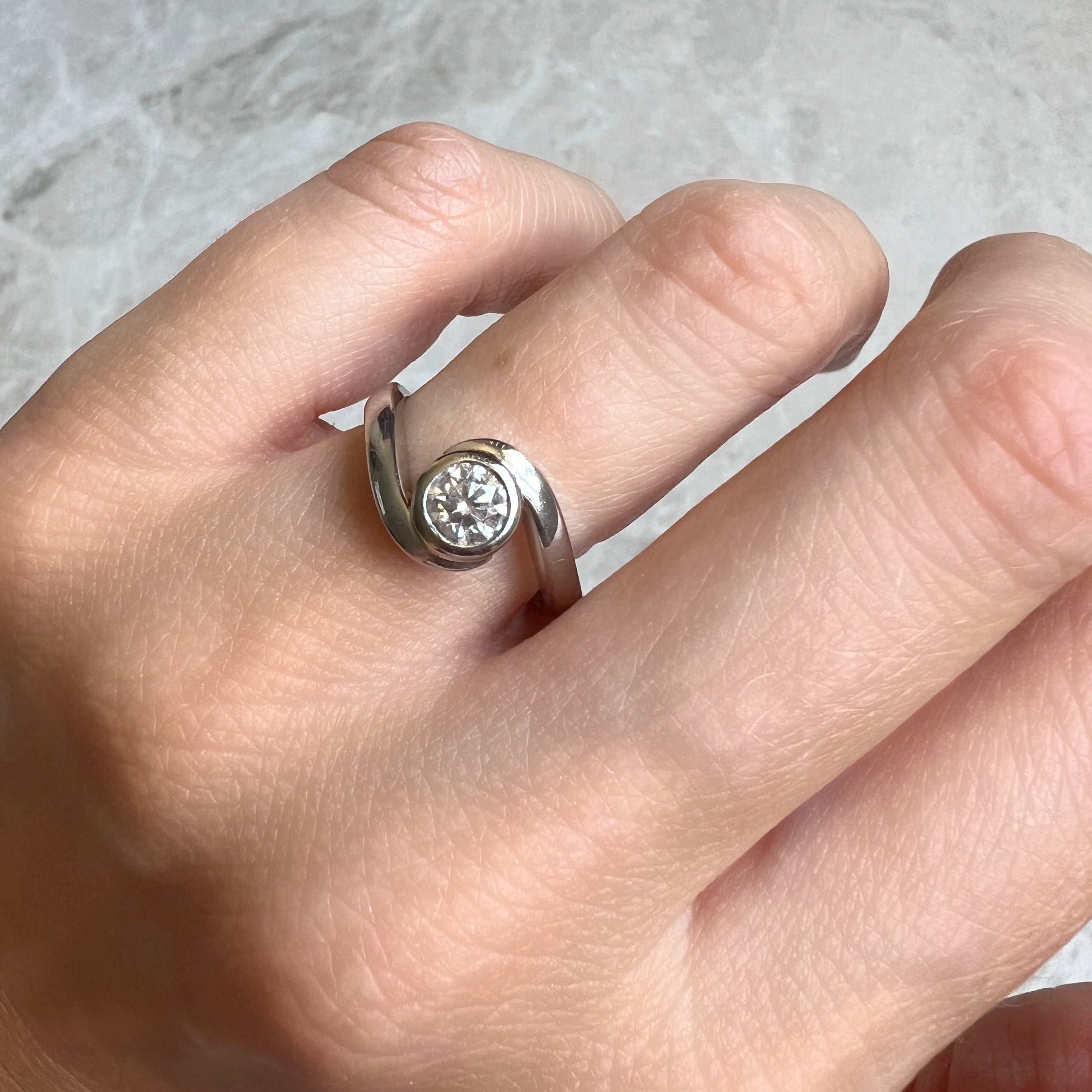 Platinum and Diamond Swirl Ring