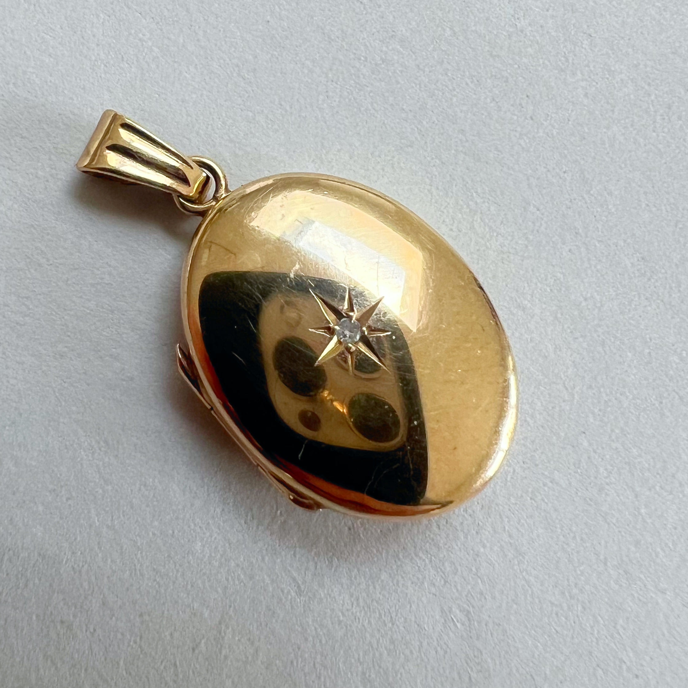 Vintage 9ct Oval Locket with Star Set Diamond