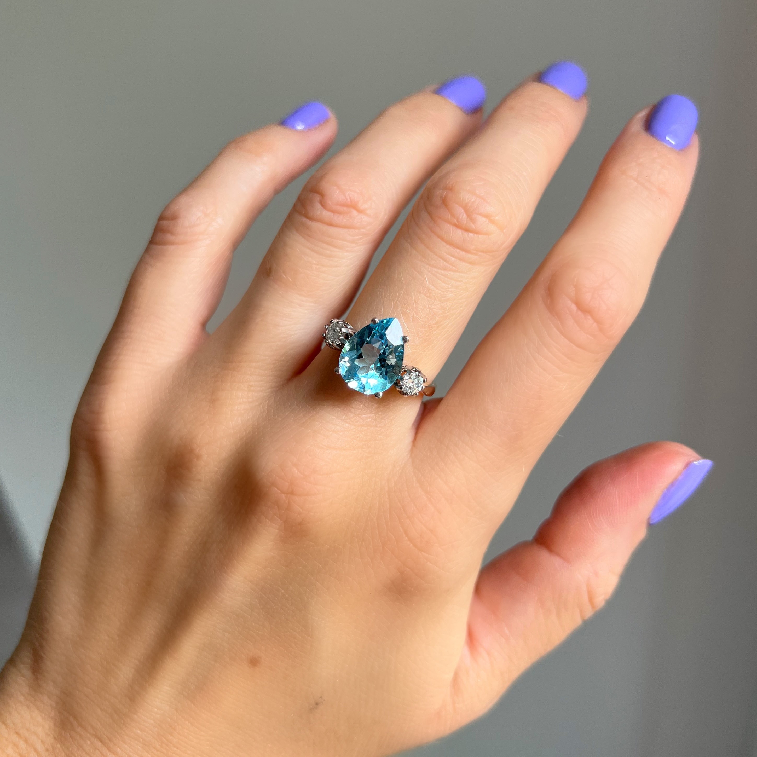 Pear Shaped Blue Topaz and Diamond Ring