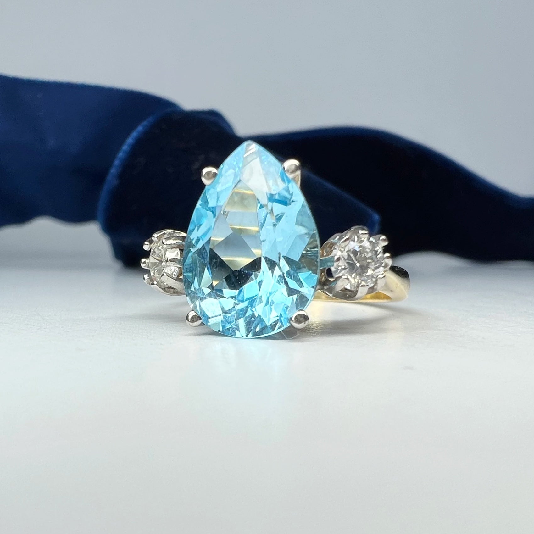Pear Shaped Blue Topaz and Diamond Ring