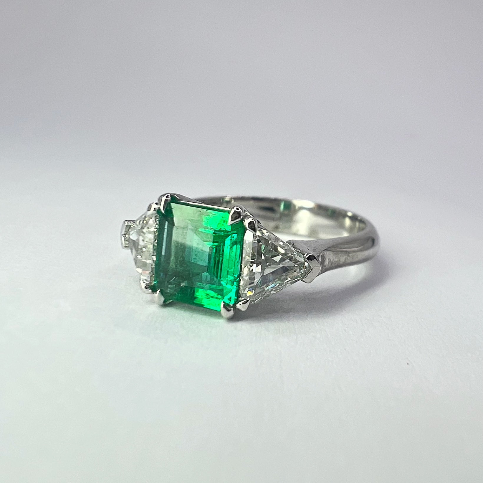 Emerald and Diamond Trillion Cut Three Stone Ring