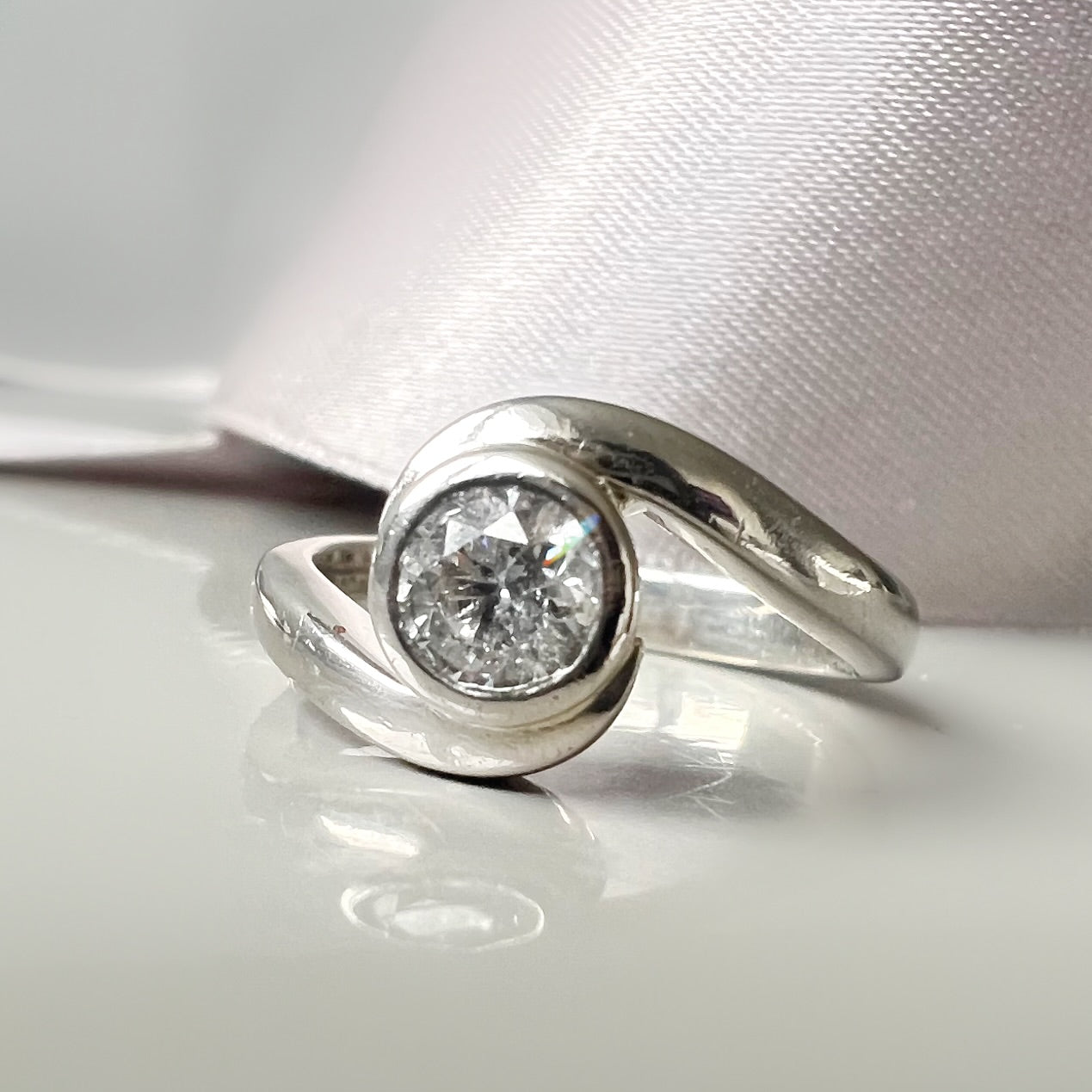 Platinum and Diamond Swirl Ring