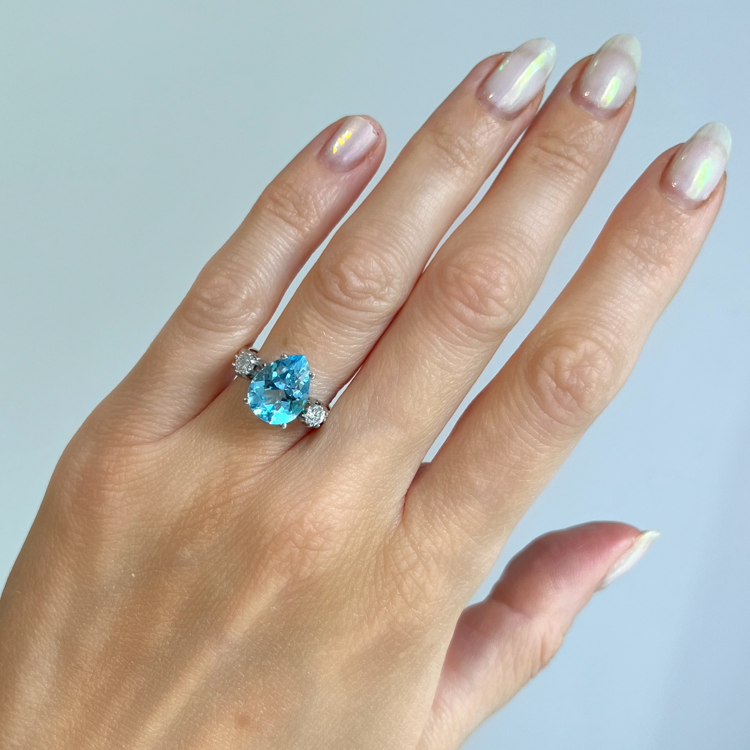 Pear Shaped Blue Topaz and Diamond Ring