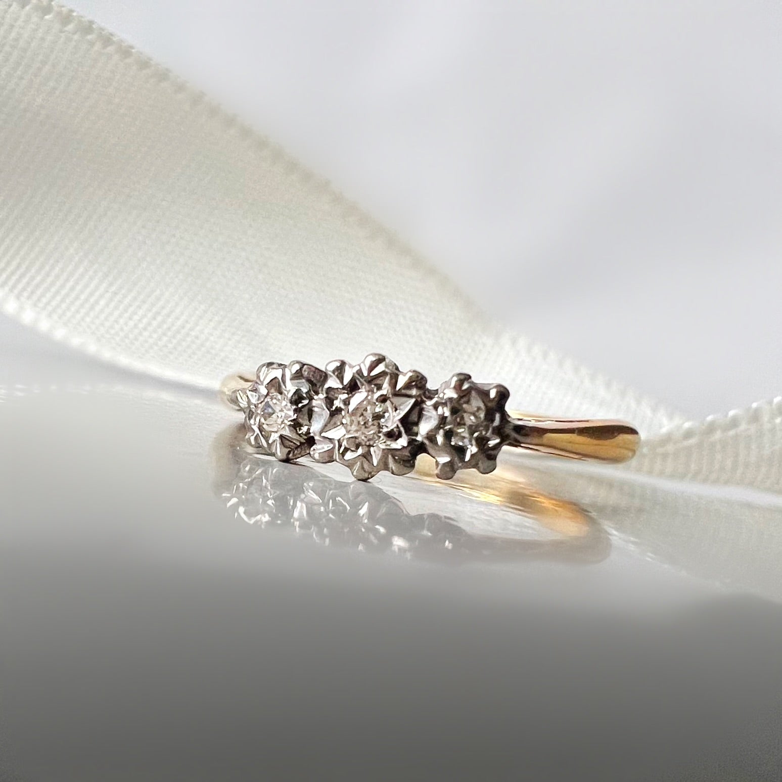 Antique Illusion Set Diamond and 18ct Ring
