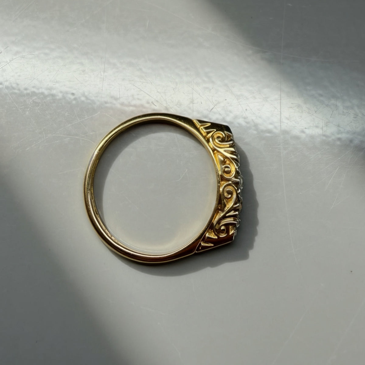 Antique Graduated 0.10ct Diamond Ring