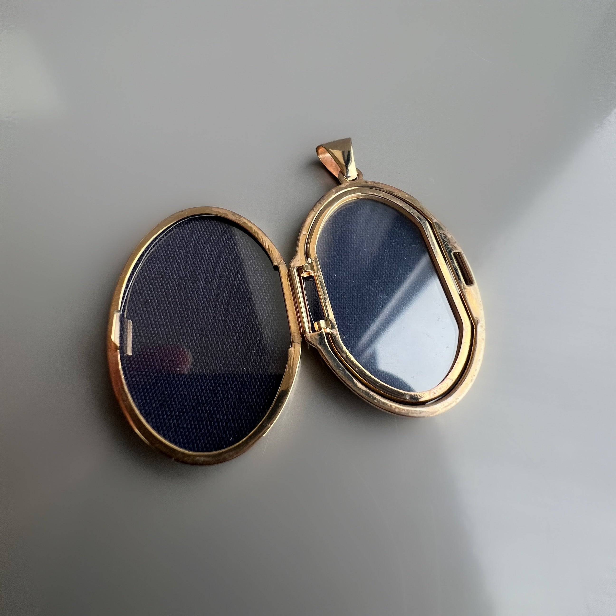 Vintage 9ct Gold Oval Shaped Locket with Floral Engraving