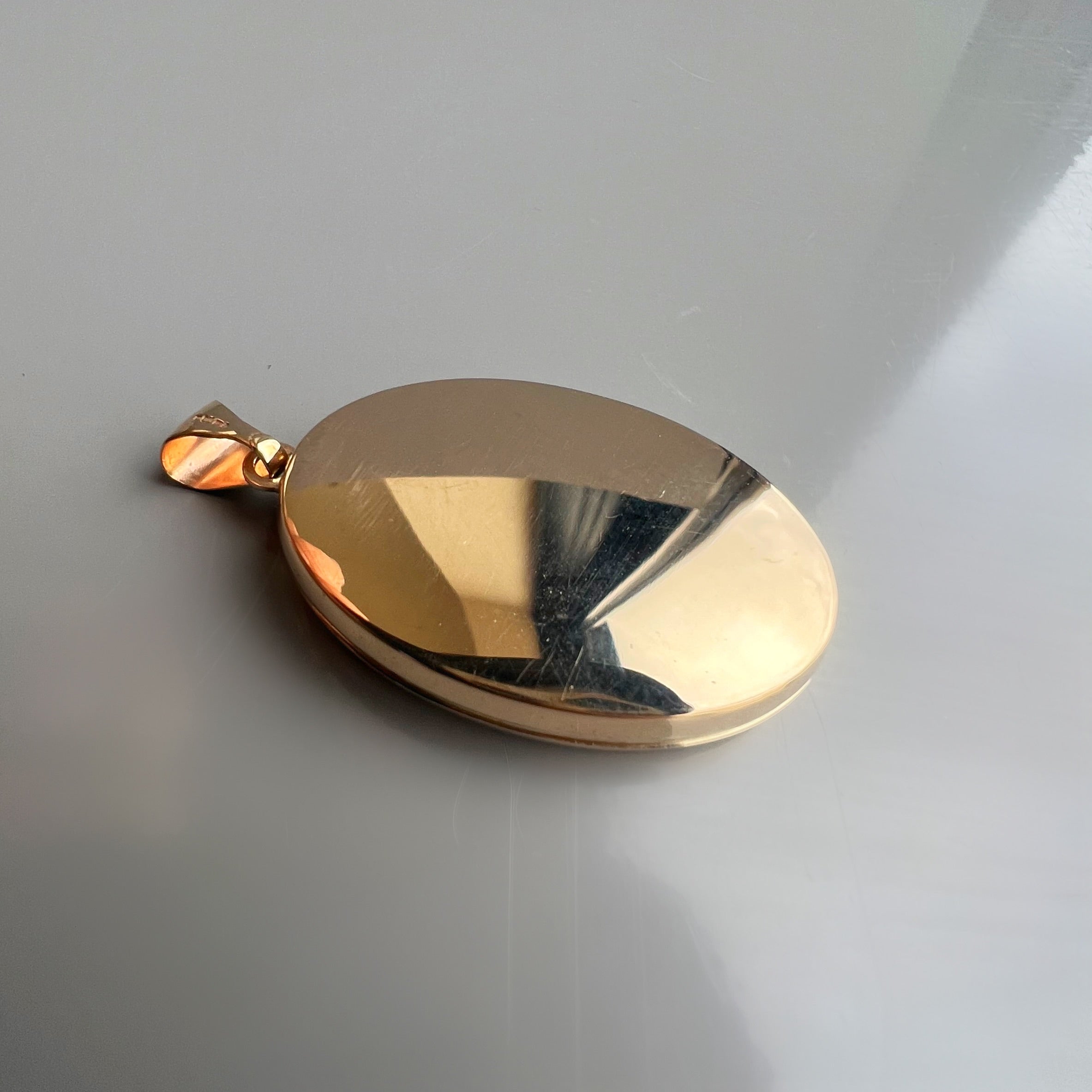 Vintage 9ct Gold Oval Shaped Locket with Floral Engraving