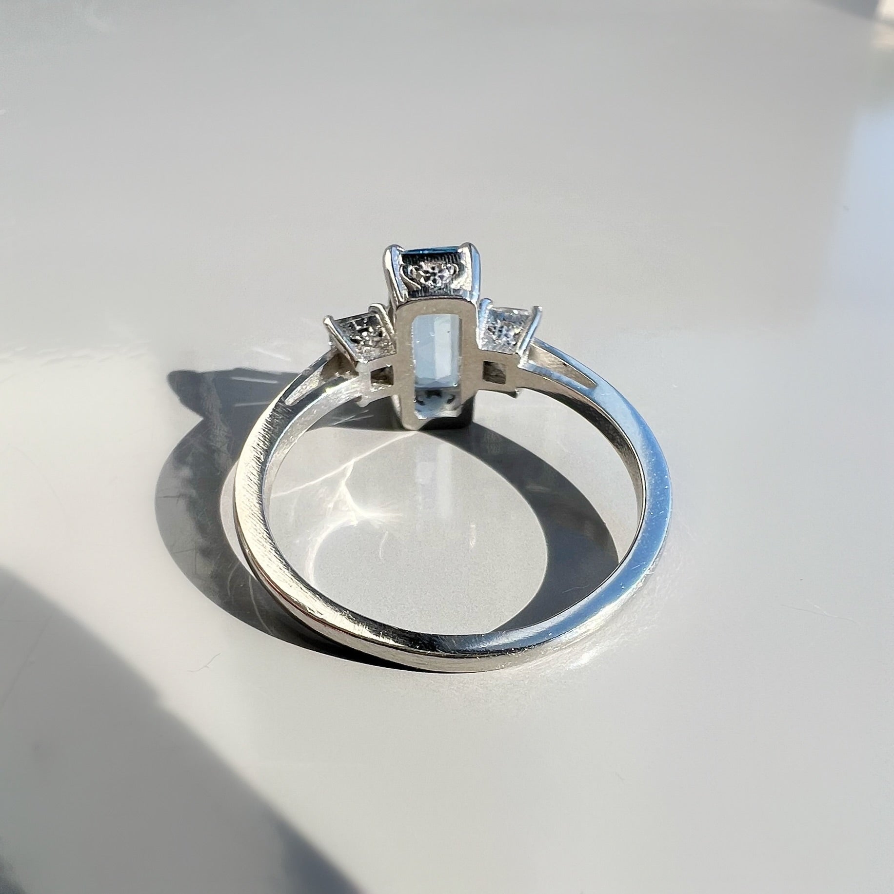 0.80ct Aquamarine and 0.26ct Princess Cut Diamond 3 Stone Ring