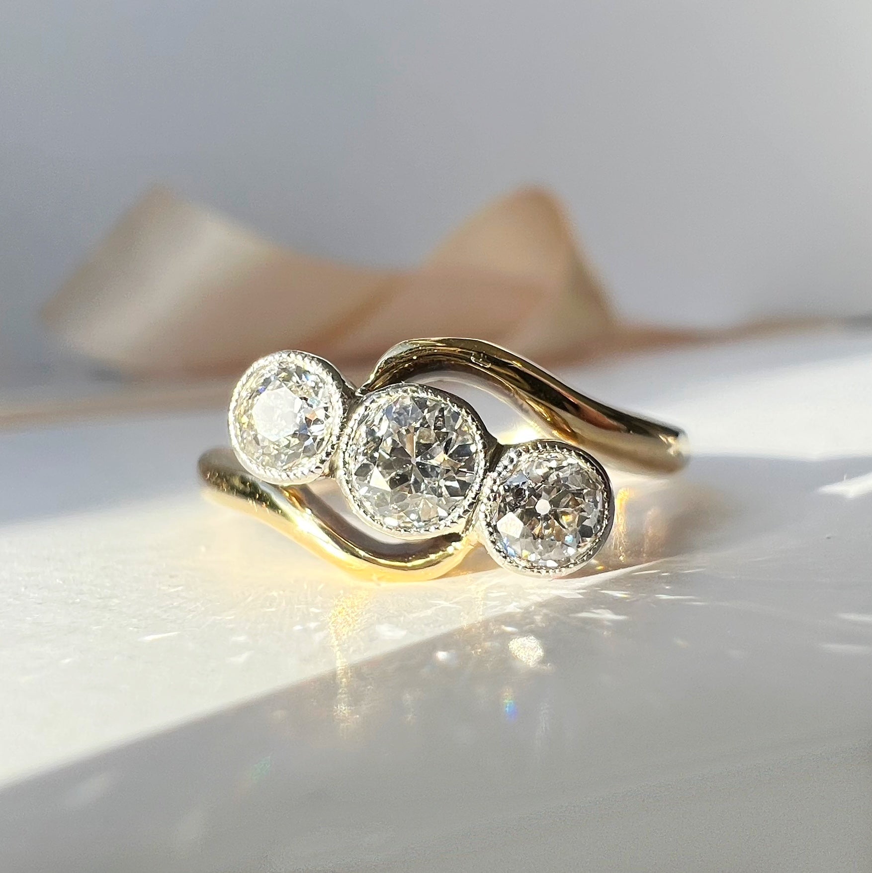 Antique 3 Stone Diamond Swirl Ring