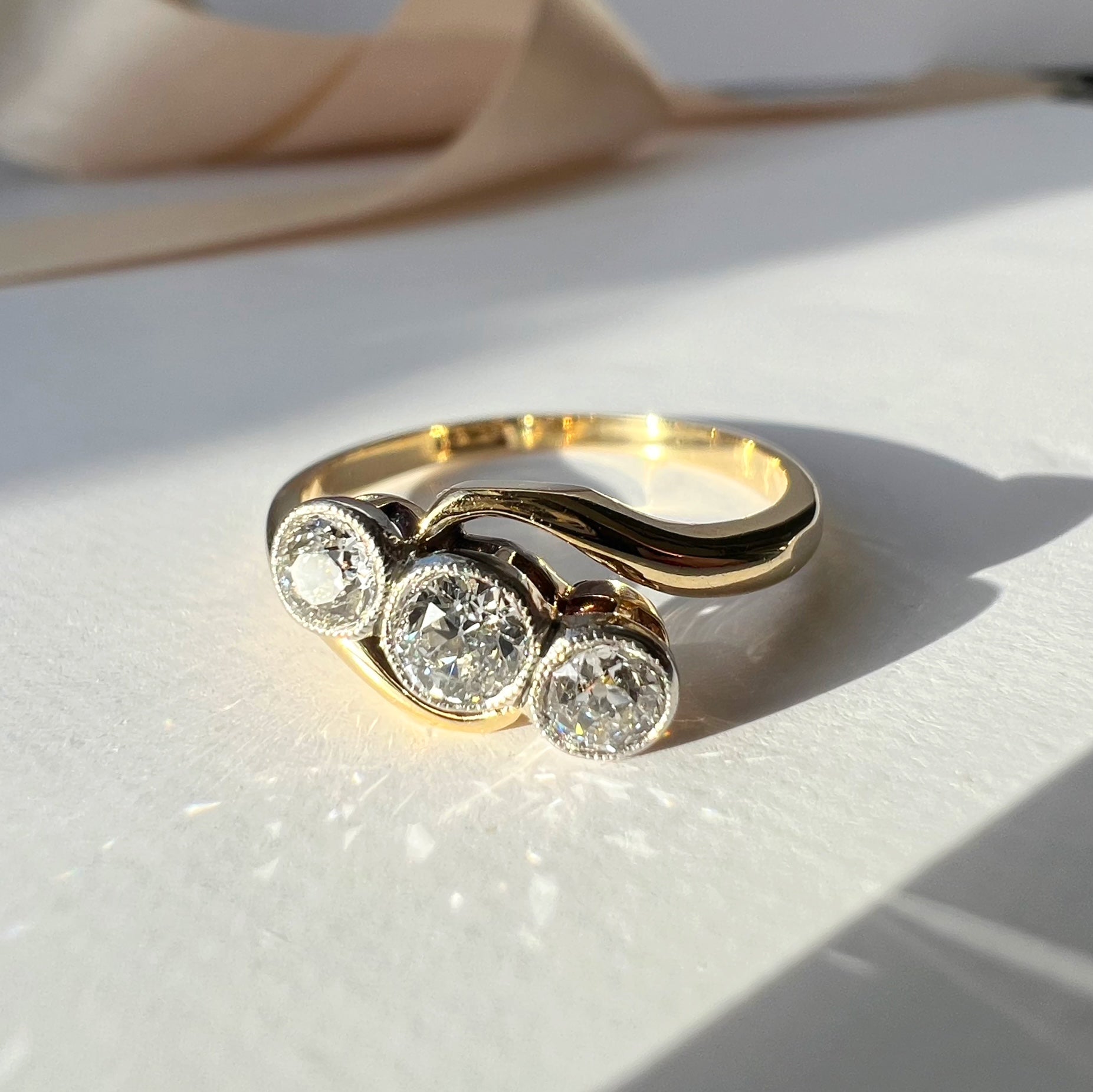 Antique 3 Stone Diamond Swirl Ring