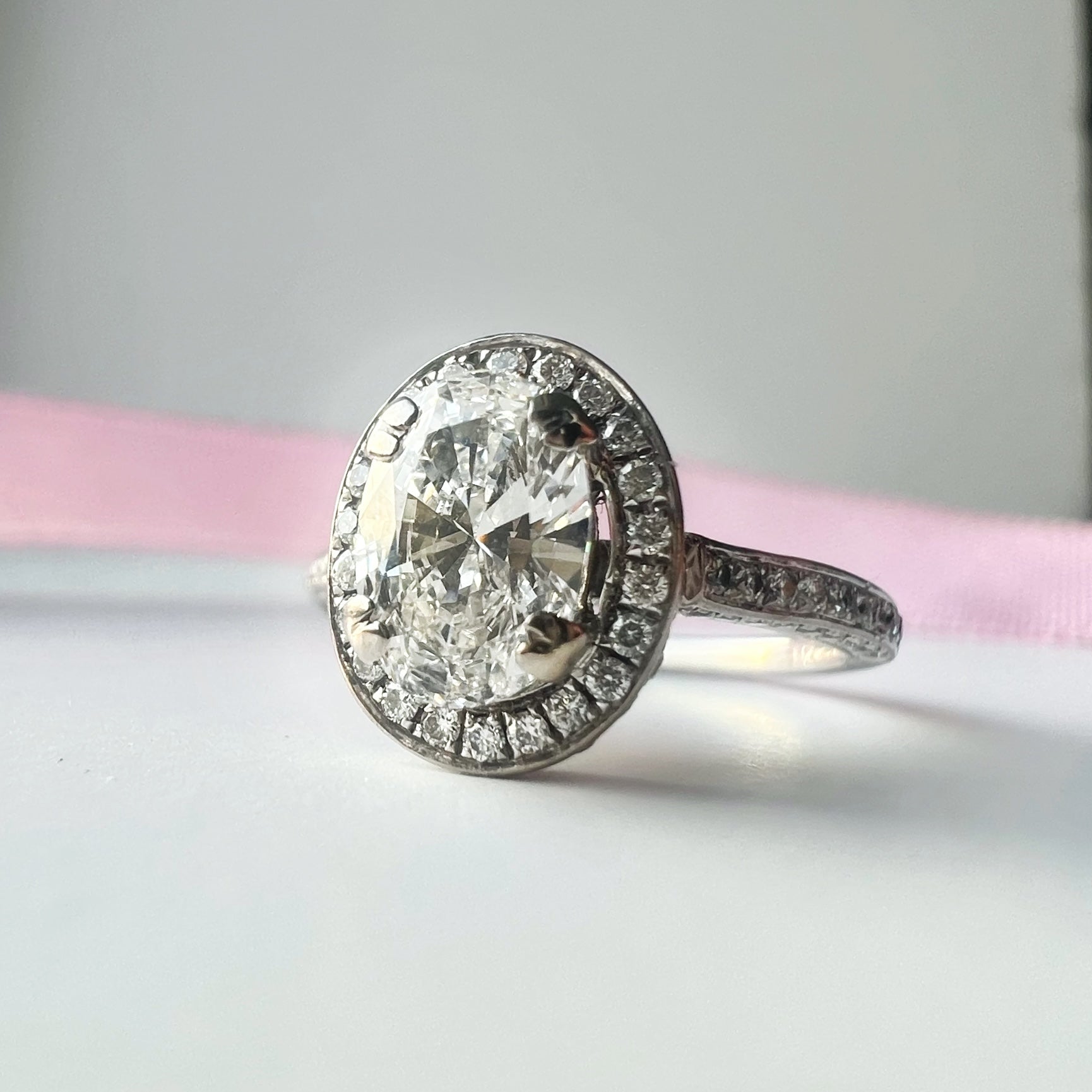 1.25 TCW Oval Diamond Halo Engagement Ring