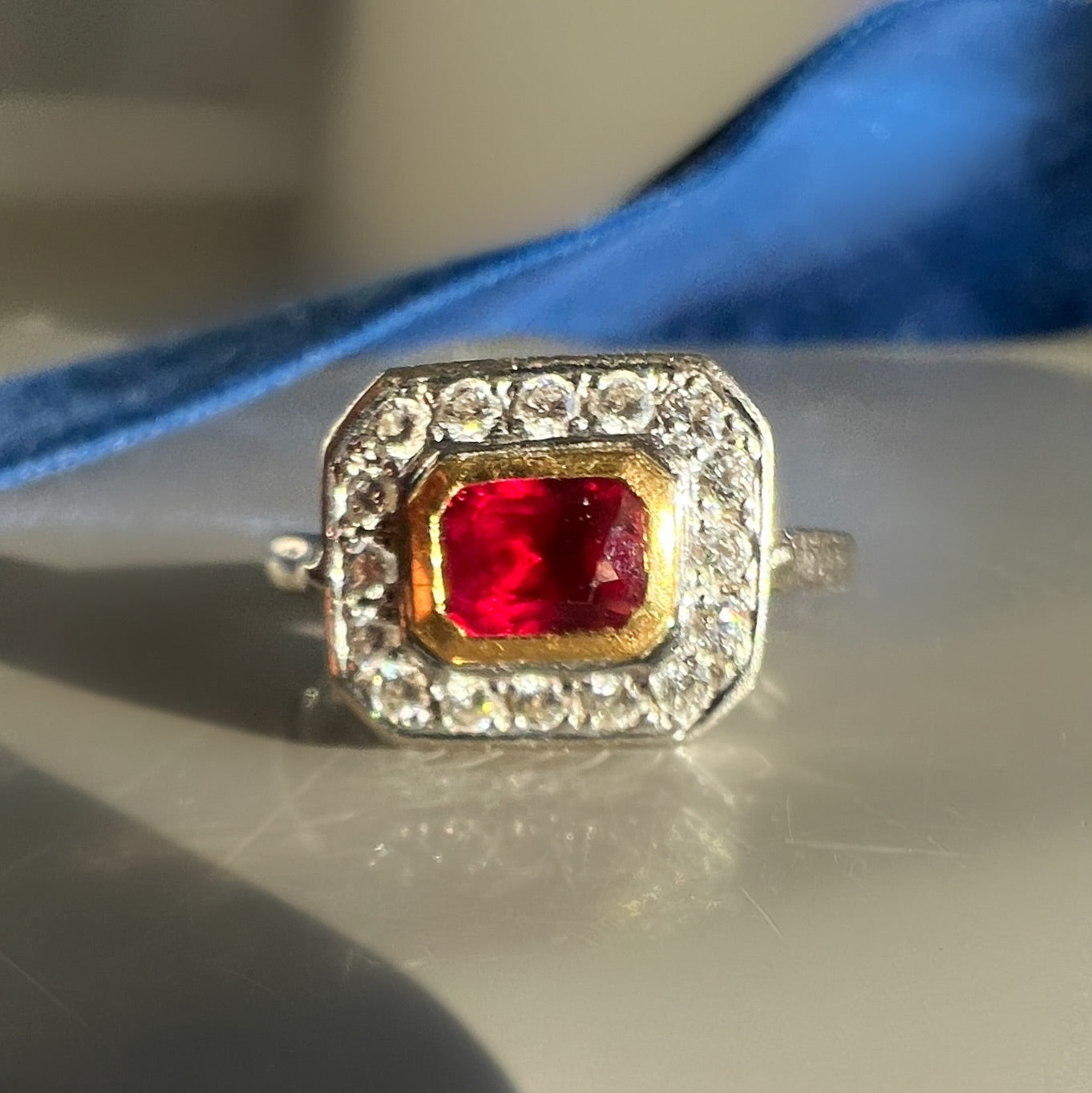 Vintage Ruby and Diamond Geometric Halo Ring in 18ct White Gold